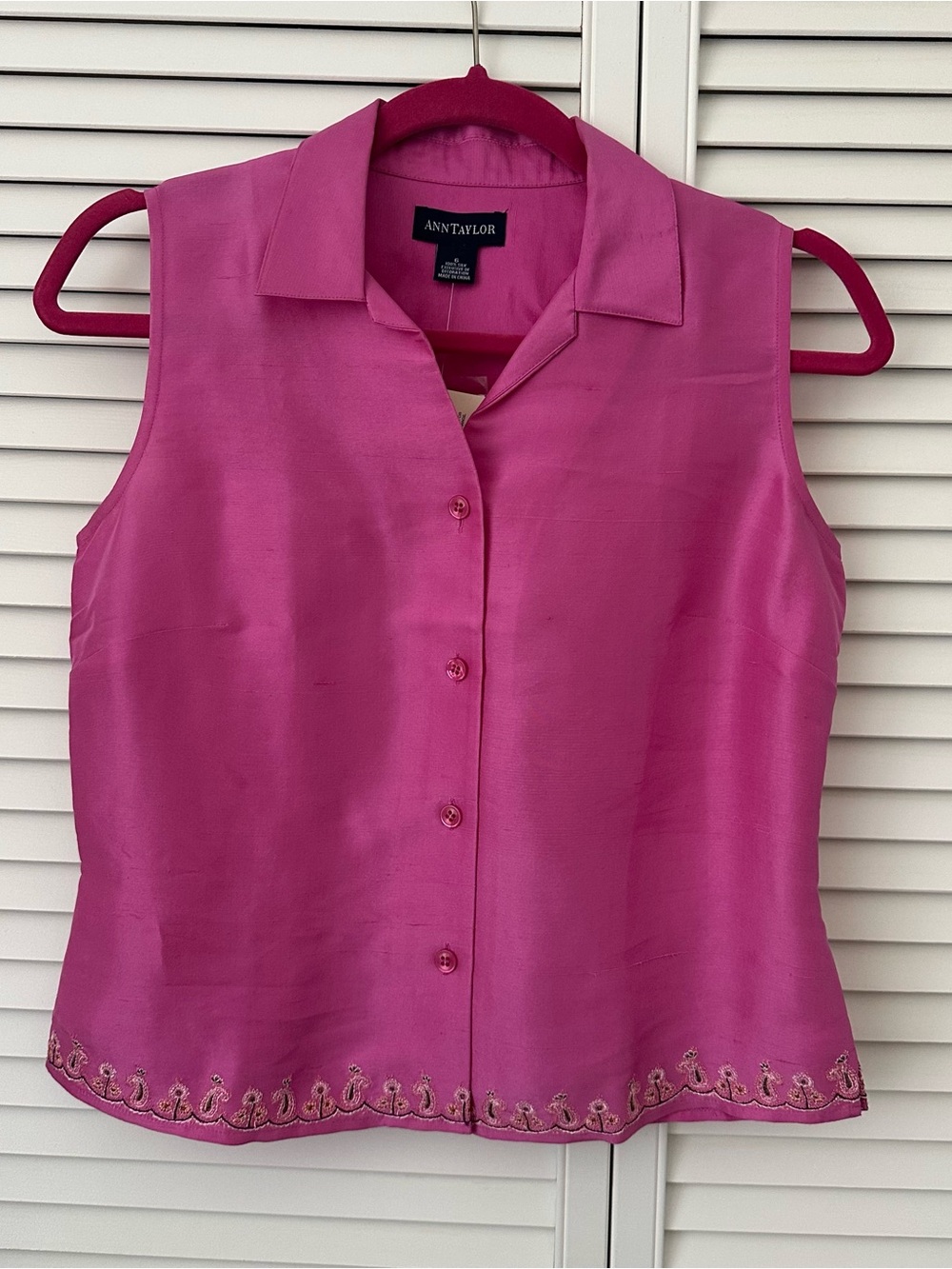 Ann Taylor Sleeveless Silk Button-Front Top in Bright Pink with embroidered hem